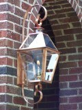 CH-27 wall mounted copper lantern with full scroll